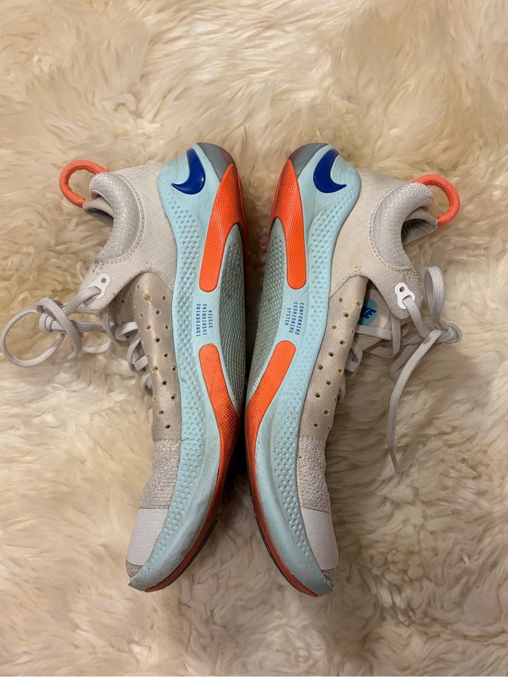 Nike Women's Sneakers in Light Gray with Blue and Orange Accents